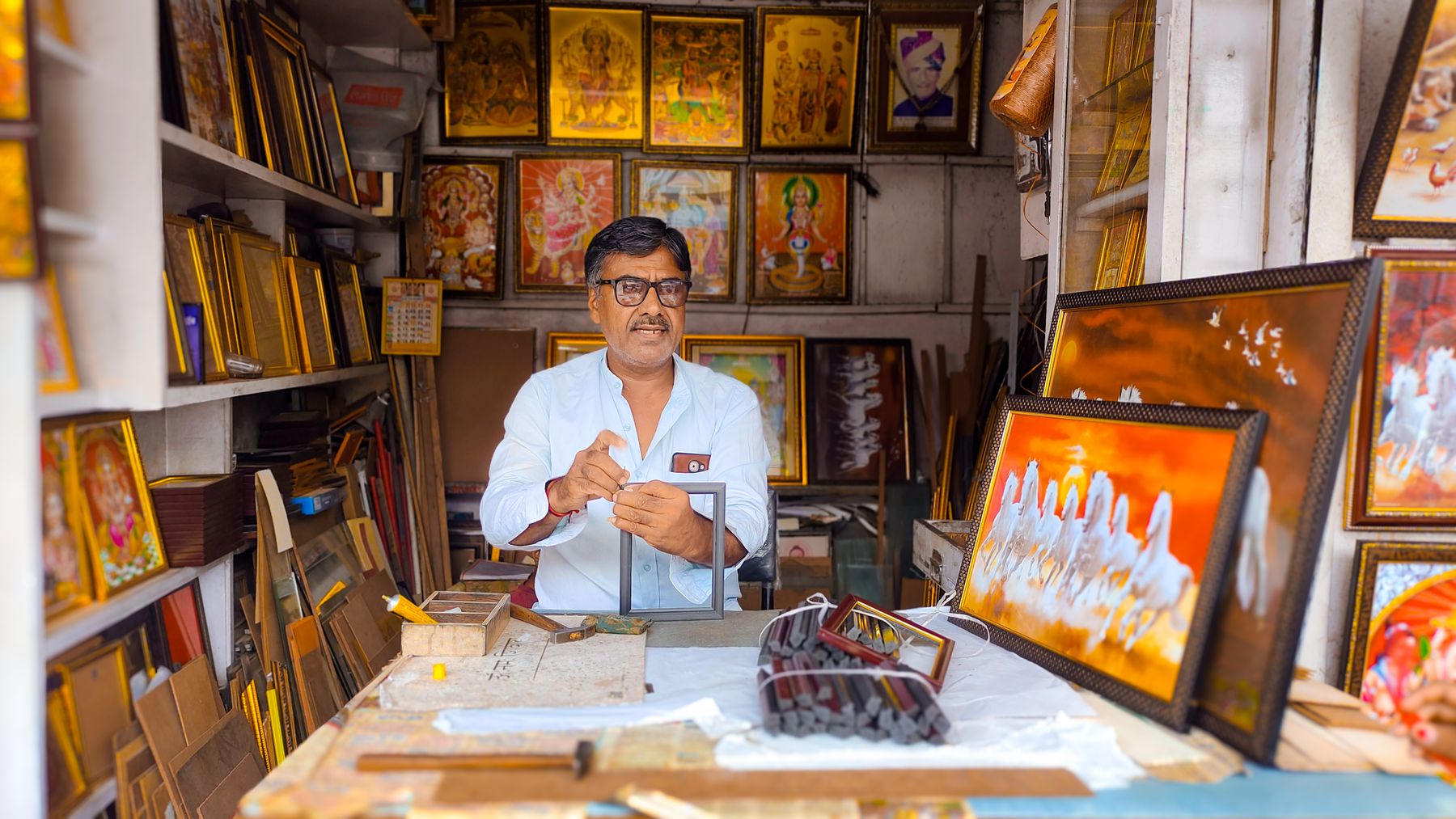 An artisan in his framing shop in Jodhpur